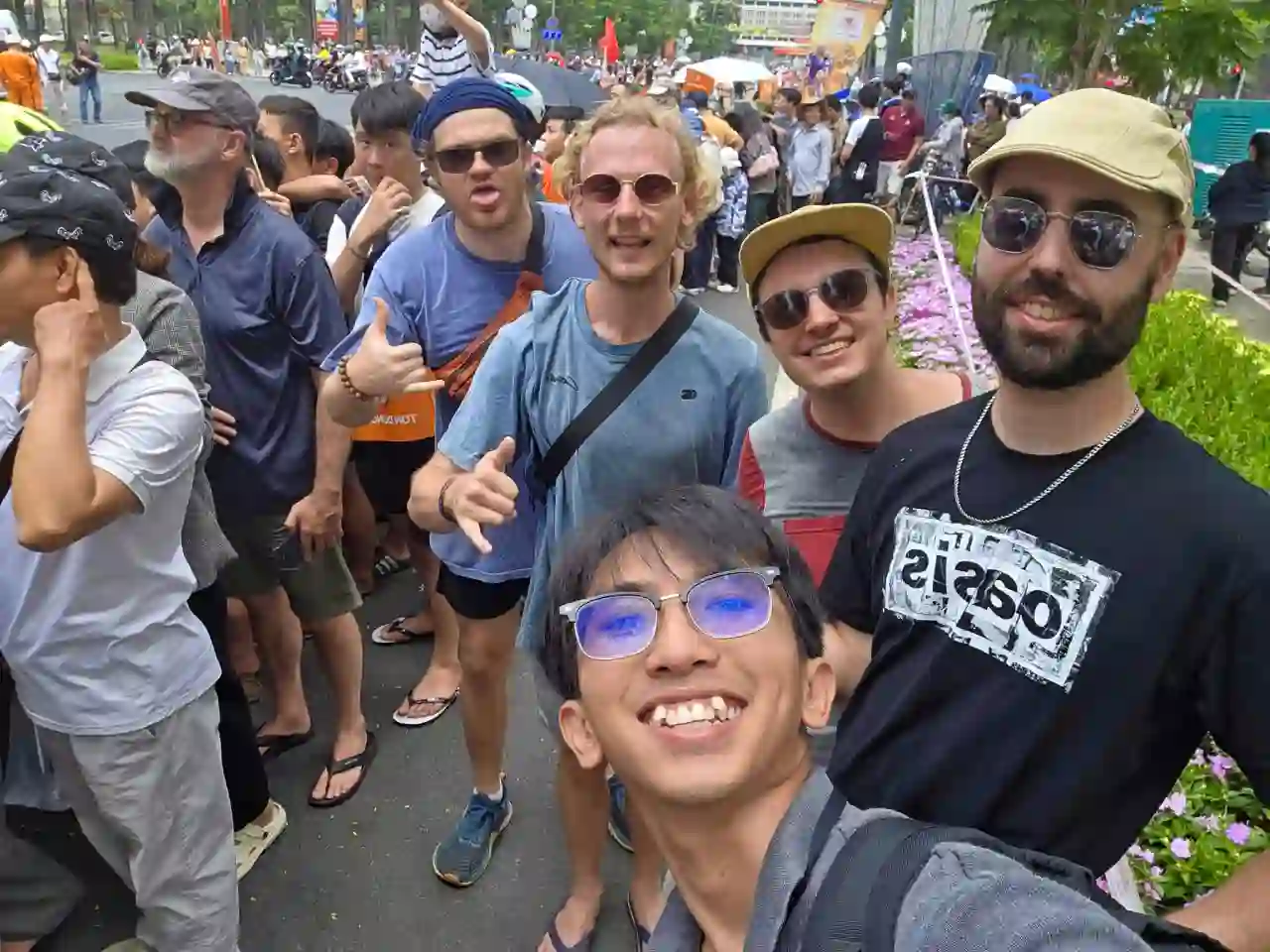 Local guide exploring Ho Chi Minh City with international travelers during a cultural walking experience