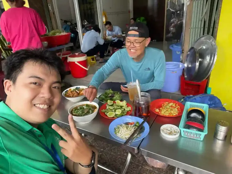 Local food experience in Saigon featuring authentic Vietnamese noodle dishes